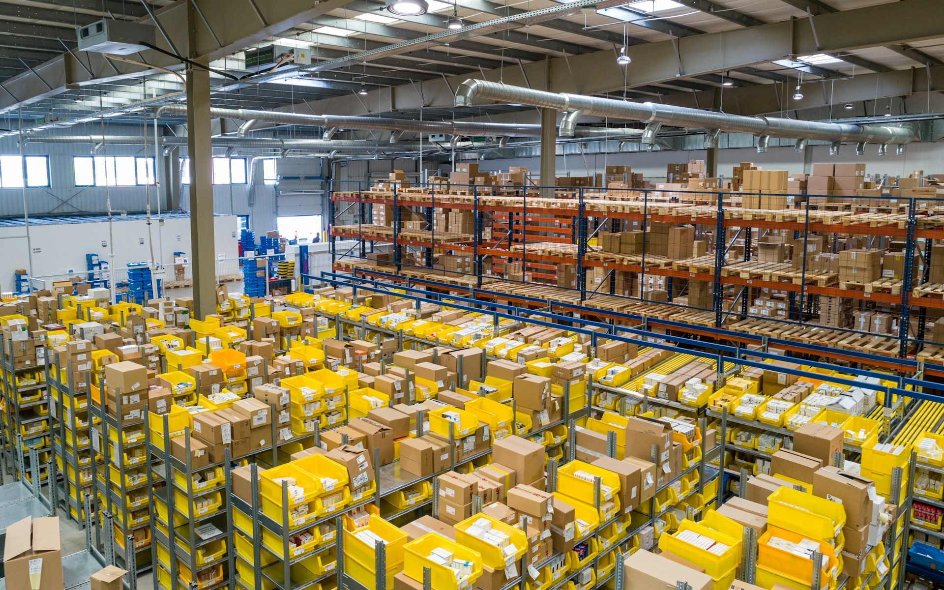 Warehouse team coordinating cartons for an international shipment
